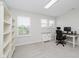 Spacious home office with natural light, plush carpet, and a practical workstation at 10962 Stoneleigh Dr, Noblesville, IN 46060