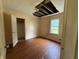 Bedroom with wood floors and a closet, but ceiling repair needed at 11026 N Kitchen Rd, Mooresville, IN 46158