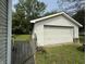 Detached one car garage with white siding, offering extra storage at 11026 N Kitchen Rd, Mooresville, IN 46158