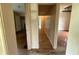 Hallway view showcasing the home's layout and hardwood flooring at 11026 N Kitchen Rd, Mooresville, IN 46158