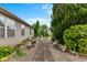 Charming backyard space with a bench and garden decorations at 1202 Orphant Annie, Greenfield, IN 46140