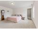 Bright bedroom boasts neutral carpet, ensuite access, and an overhead light at 1202 Orphant Annie, Greenfield, IN 46140