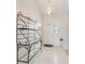 Inviting entryway featuring stylish light fixture and tiled flooring at 1202 Orphant Annie, Greenfield, IN 46140
