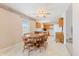 Eat-in kitchen with ceiling fan, oak cabinets, and white appliances at 1202 Orphant Annie, Greenfield, IN 46140