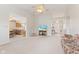 Open-concept living room flows into the kitchen and entryway at 1202 Orphant Annie, Greenfield, IN 46140