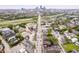 Aerial view showcasing the city skyline, surrounding neighborhoods, and the well-maintained streets at 1209 Cottage Ave, Indianapolis, IN 46203