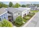 A high-angle view of modern residences situated near a street, showcasing uniform design and landscaping at 1209 Cottage Ave, Indianapolis, IN 46203