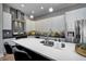 Modern kitchen features stainless steel appliances, sleek cabinets, and a large quartz countertop island at 1209 Cottage Ave, Indianapolis, IN 46203