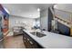 Sleek kitchen with a large island, modern fixtures, and an open view to the living area at 1209 Cottage Ave, Indianapolis, IN 46203