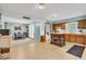 Open concept view of the dining room and kitchen featuring an island and stainless appliances at 12121 East 21St St, Indianapolis, IN 46229