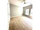 Large carpeted bedroom with two windows and a ceiling fan at 1280 Shadow Ridge Rd, Indianapolis, IN 46280