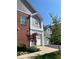 Exterior of home featuring neutral siding, brick accents, and well manicured landscaping at 1280 Shadow Ridge Rd, Indianapolis, IN 46280
