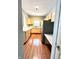 Bright kitchen featuring stainless steel appliances, wooden cabinets, and warm wood-look flooring at 1280 Shadow Ridge Rd, Indianapolis, IN 46280