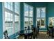 Bright lounge area with comfortable seating and large windows overlooking the community pool at 1280 Shadow Ridge Rd, Indianapolis, IN 46280