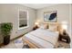 Cozy bedroom with neutral decor, natural light, and stylish accents at 13094 N Etna Green Dr, Camby, IN 46113