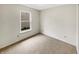 Neutral bedroom with natural light and a view to the outdoors at 13094 N Etna Green Dr, Camby, IN 46113