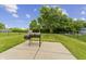 Spacious backyard with a well-maintained lawn, patio, and a barbecue grill perfect for outdoor enjoyment at 1313 Kenwood Dr, Greenwood, IN 46143
