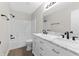 Bathroom boasts a double vanity, modern fixtures, and bathtub at 1313 Kenwood Dr, Greenwood, IN 46143