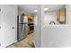Bright kitchen featuring stainless steel appliances, wood cabinets, and modern flooring at 1313 Kenwood Dr, Greenwood, IN 46143