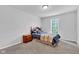 Sunlit bedroom with carpeted floor, classic wooden furniture and serene window view at 13766 Heatherfield Dr, Fishers, IN 46038