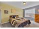 Comfortable bedroom with a queen-sized bed, soft carpeting, and a serene atmosphere for restful nights at 13766 Heatherfield Dr, Fishers, IN 46038