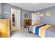 Spacious bedroom with soft carpeting, closet access, and natural light creates a cozy and inviting retreat at 13766 Heatherfield Dr, Fishers, IN 46038