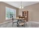 Charming dining room featuring a round table, and a large window at 13766 Heatherfield Dr, Fishers, IN 46038