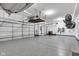 Spacious three car garage with epoxy floors and ample storage at 13766 Heatherfield Dr, Fishers, IN 46038
