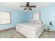 Comfortable bedroom with stylish decor, ceiling fan, and bright windows at 1514 Bittersweet Dr, Greenfield, IN 46140
