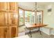 Charming dining nook with a bay window, built-in seating, and a beautiful table set at 1514 Bittersweet Dr, Greenfield, IN 46140
