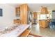 Bright and airy kitchen with wooden cabinets and stainless-steel appliances, offering a spacious and functional design at 1514 Bittersweet Dr, Greenfield, IN 46140