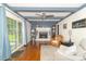 Cozy living room with fireplace and exposed beams, perfect for relaxing at 1514 Bittersweet Dr, Greenfield, IN 46140