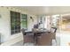 Inviting sunroom with glass sliding door providing a relaxing space to enjoy views of the backyard at 1514 Bittersweet Dr, Greenfield, IN 46140