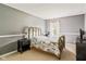 Cozy bedroom with neutral walls, carpet and a full bed with a dark-colored nightstand at 15409 Heath Cir, Westfield, IN 46074