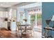Bright eat-in kitchen featuring hardwood floors and lots of natural light at 15409 Heath Cir, Westfield, IN 46074