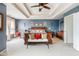 Spacious main bedroom with a coffered ceiling, carpet, and a large ornate bed at 15409 Heath Cir, Westfield, IN 46074