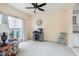 Cozy office featuring a computer desk, decorative mirror, and large window with natural light at 15409 Heath Cir, Westfield, IN 46074