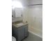 Updated bathroom featuring modern vanity with granite counters and tiled floors at , Indianapolis, IN 46218