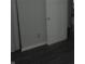 Hallway entrance with neutral walls, and hardwood floors at , Indianapolis, IN 46218