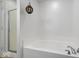 Bright bathroom features a separate shower and soaking tub with chrome fixtures at 1905 Persimmon Grove Dr, Indianapolis, IN 46234