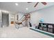 Upstairs bonus room featuring a basketball hoop, golf putting mat and fun game storage for entertainment and activity at 1905 Persimmon Grove Dr, Indianapolis, IN 46234