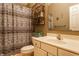 Bathroom featuring a single sink vanity and a shower with a decorative shower curtain at 2017 Rhettsbury St, Carmel, IN 46032