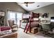 bedroom featuring a red bunk bed, desk, and cozy furniture at 2017 Rhettsbury St, Carmel, IN 46032