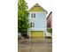 Charming multi-story home with colorful siding and a green garage door at 2017 Rhettsbury St, Carmel, IN 46032