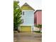 Two-story home featuring a green garage door and blue siding with bright-colored exterior at 2017 Rhettsbury St, Carmel, IN 46032