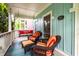 Cozy porch featuring comfortable seating and charming decor, perfect for relaxing outdoors with a scenic neighborhood view at 2017 Rhettsbury St, Carmel, IN 46032