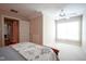 Bright bedroom with a ceiling fan, large window, and ample space at 2223 Shaftesbury Rd, Carmel, IN 46032