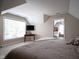 Comfortable bedroom features a large window for natural light and a doorway to another bedroom at 2223 Shaftesbury Rd, Carmel, IN 46032