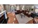 Spacious living room showcasing hardwood floors, comfortable seating and a cozy fireplace at 2223 Shaftesbury Rd, Carmel, IN 46032