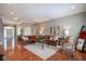Spacious living room with hardwood floors, recessed lighting, and comfortable furnishings at 2223 Shaftesbury Rd, Carmel, IN 46032